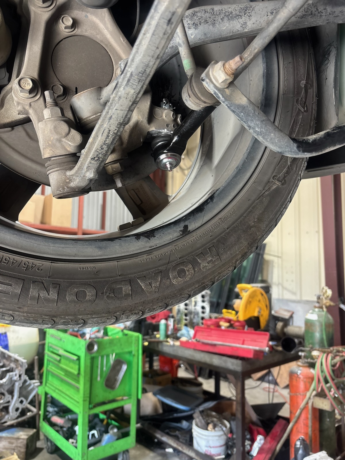Front suspension and ball joint on a car on the lift