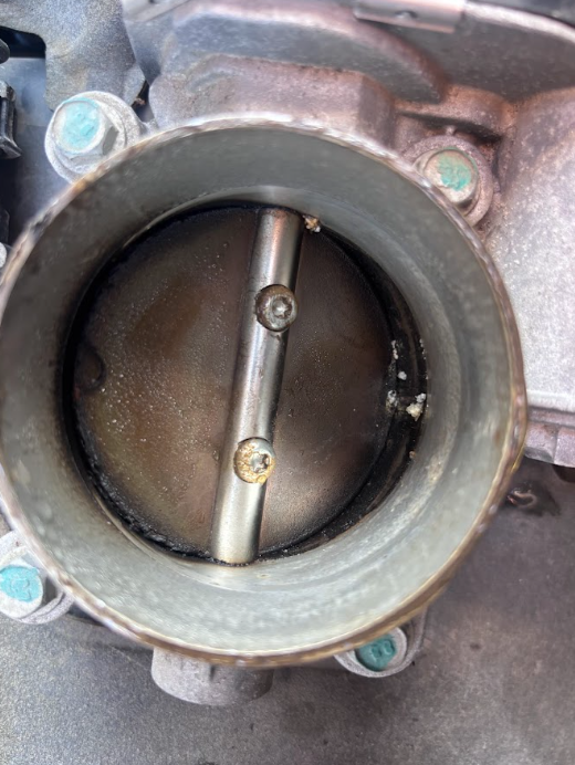 Carbon buildup inside a throttle body bore